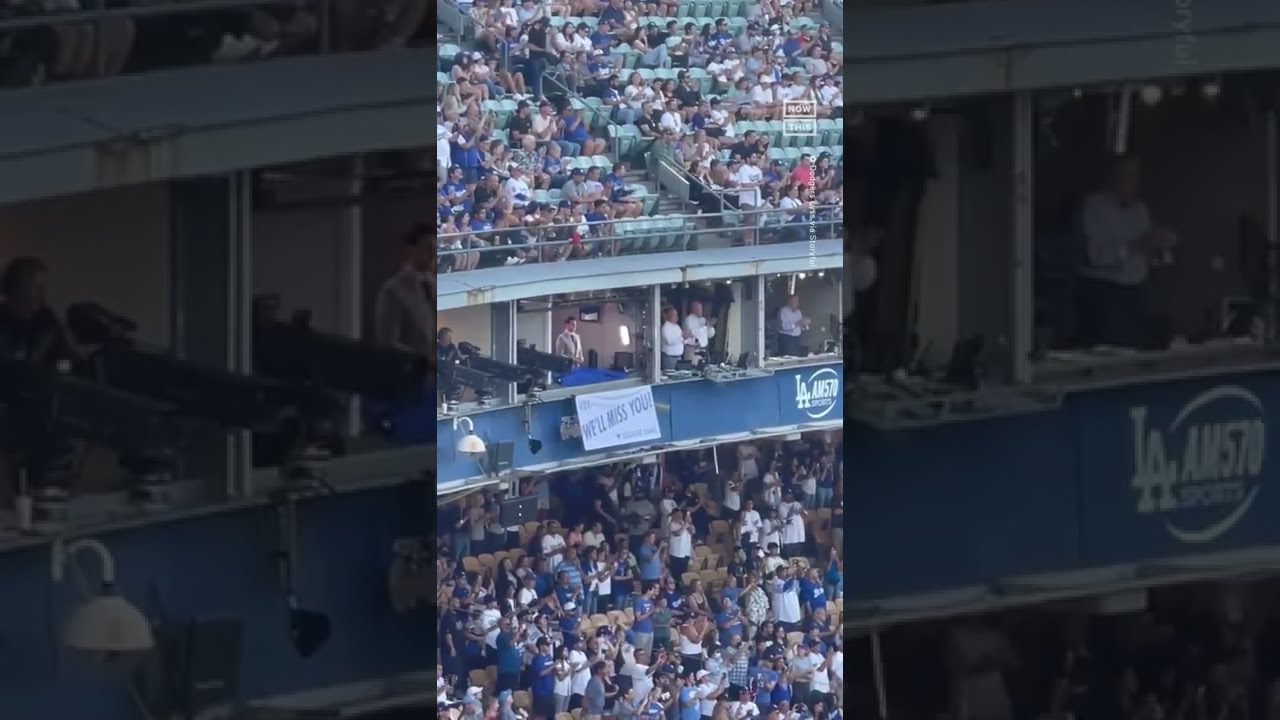 La Dodgers Hang Banner In Honor Of Sportscaster Vin Scully