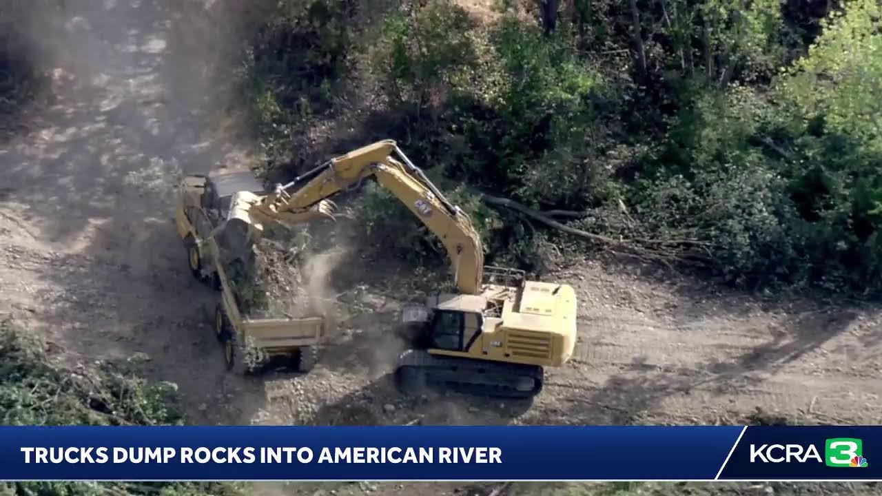Watch As Trucks Dump Rocks Into The American River To Create Spawning Beds For Salmon. This Is Do…