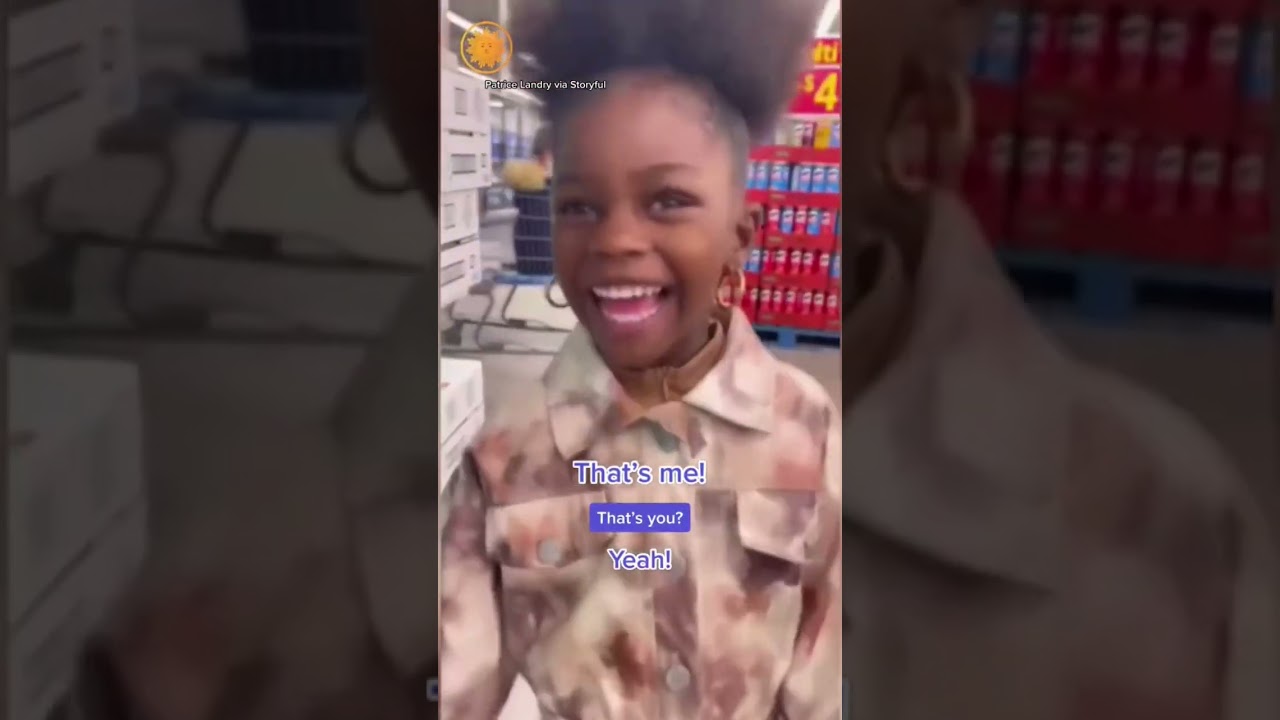 girl reacts to seeing her photo