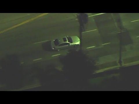 silver sedan leads car chase acr