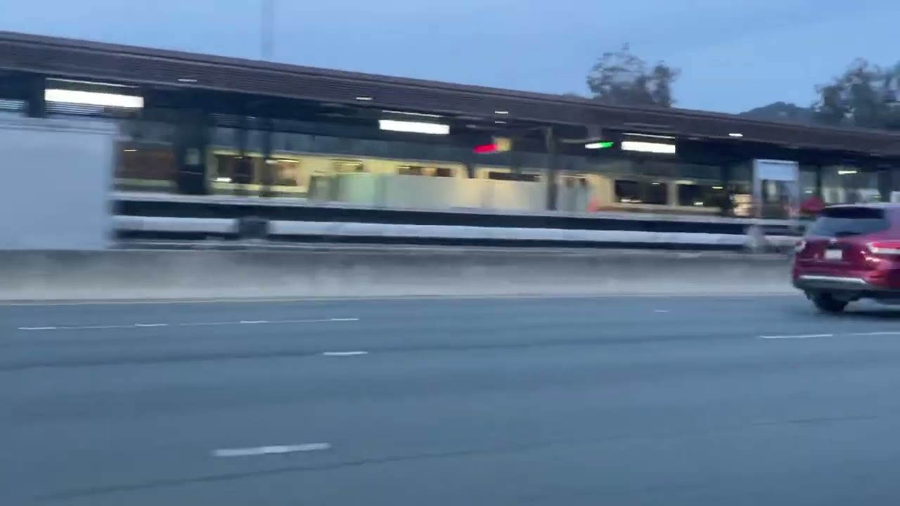 Incoming 8 car 2 door SFO airport train departing Lafayette station on hwy 24 in Lafayette 1 incoming 8 car 2 door sfo airpor