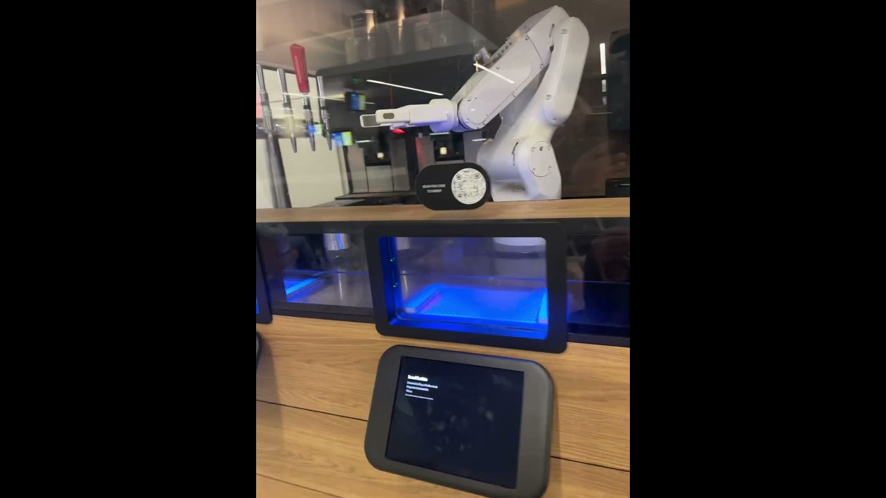 cute barista robot in sfo coffee