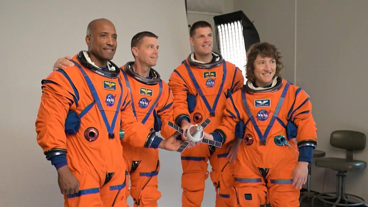 First moon crew includes one woman, three men 1 first moon crew includes one wom