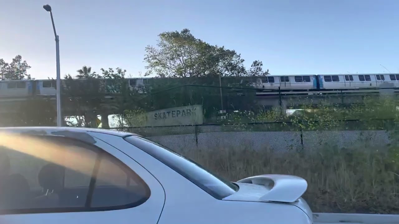Incoming 10 Car 3 Door Sfo Airport Train Departing On Platform 2 At Concord Passing Monument Blvd
