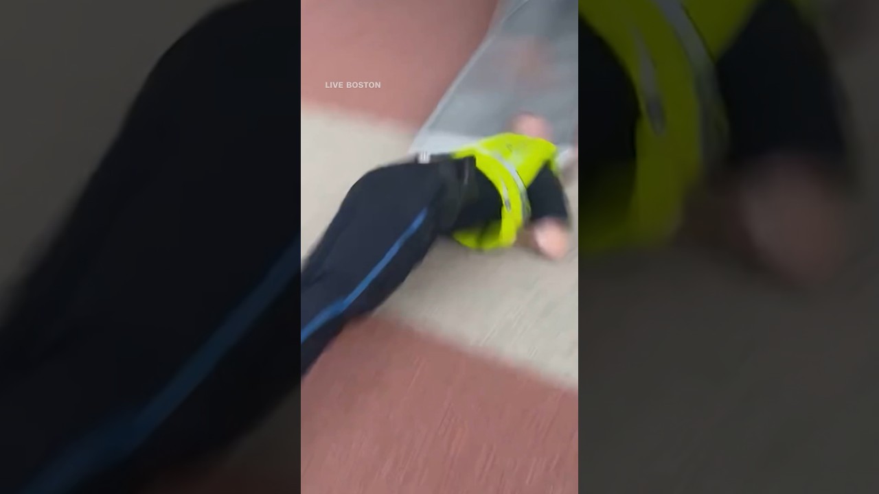 Boston Police Officer Catapults Off Playground Slide