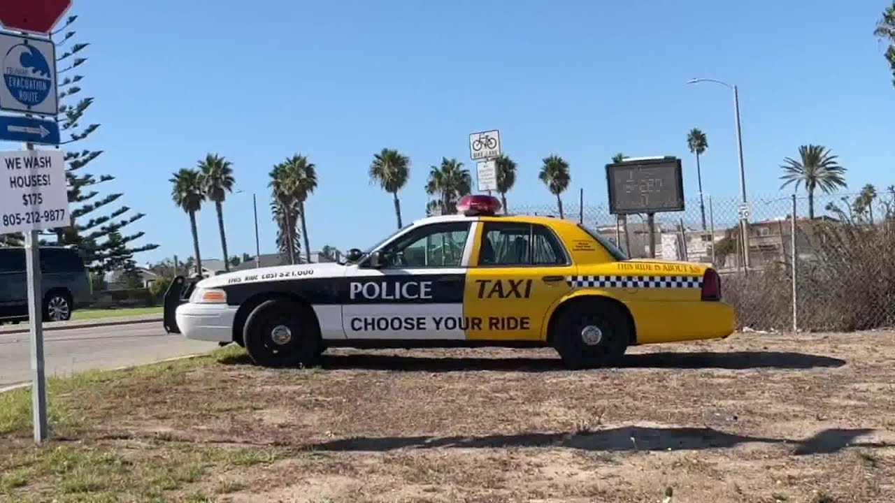 “choose Your Ride” Vehicle Looks Like A Police Car In The Front And A Taxi In The Back