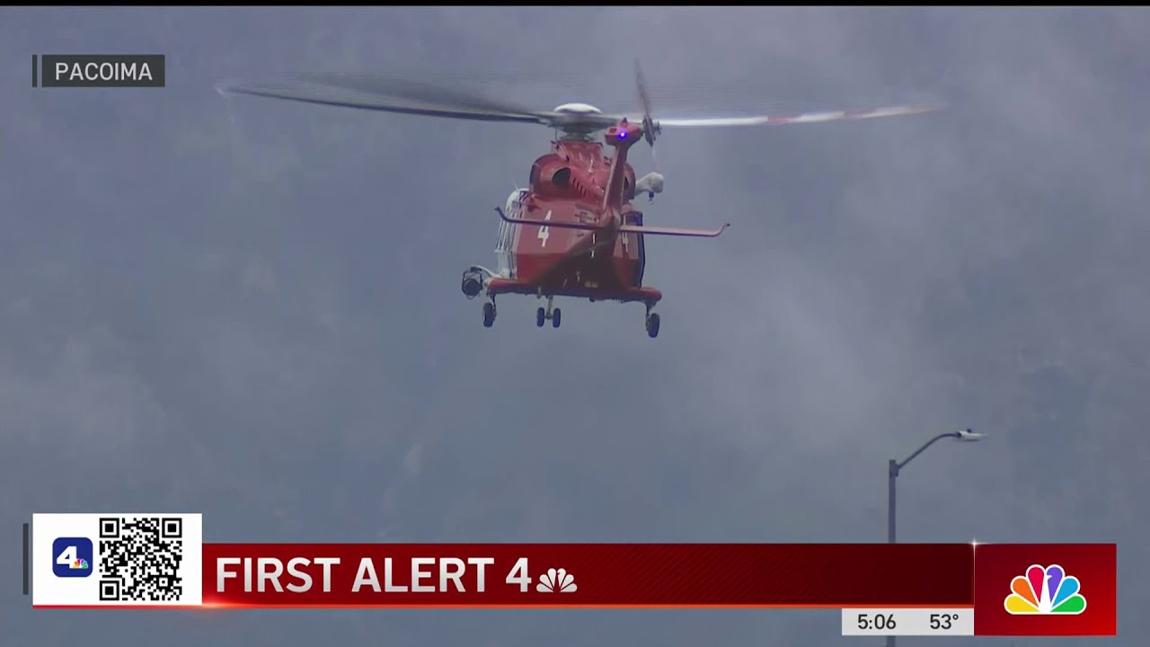man and dog rescued from flood w