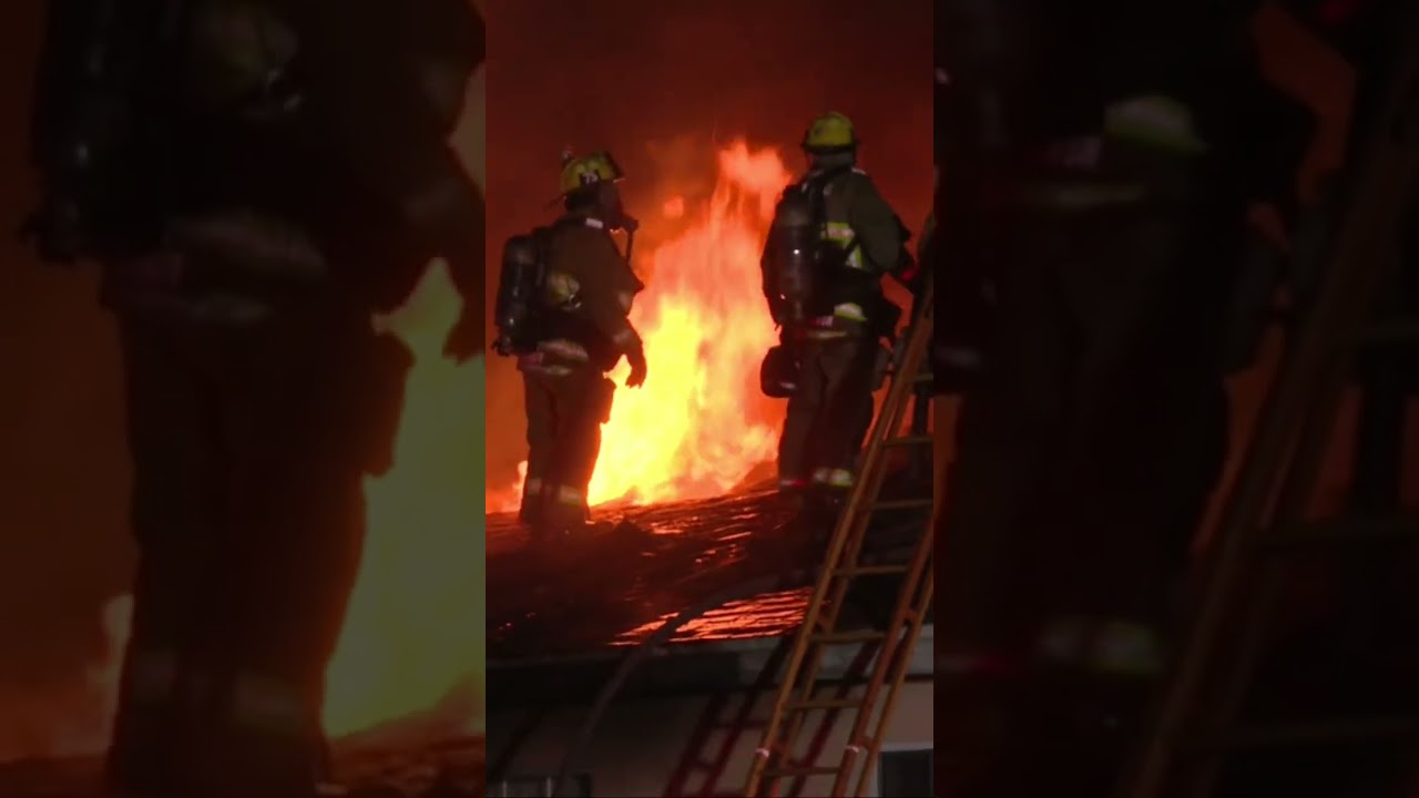 lafd truck 75 doing roof work lo