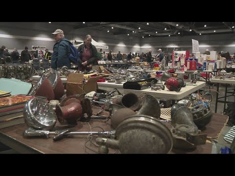 Car enthusiasts look for rare parts, fellow fans at Portland Auto Swap Meet 2 car enthusiasts look for rare pa