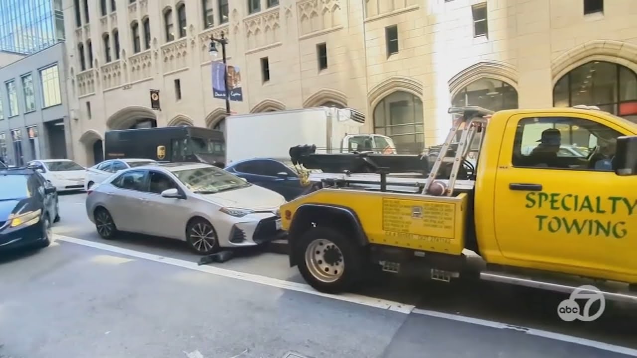 Couple says tow truck tried to nab their moving car in San Francisco - EXCLUSIVE 1 couple says tow truck tried to n