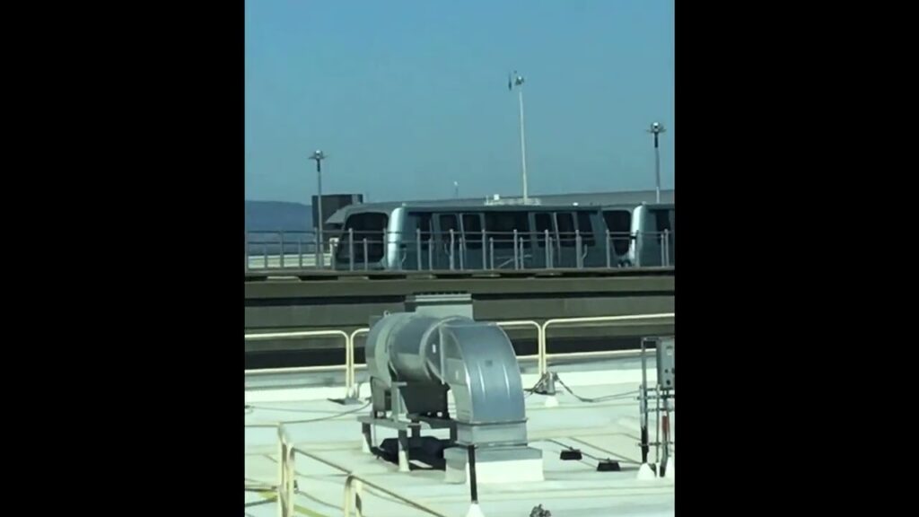 SFO (San Francisco International Airport) AirTrain Red Line departing ...