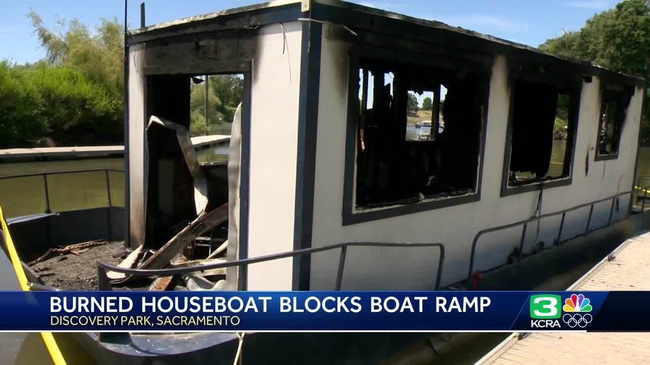 burned houseboat blocks boat ram