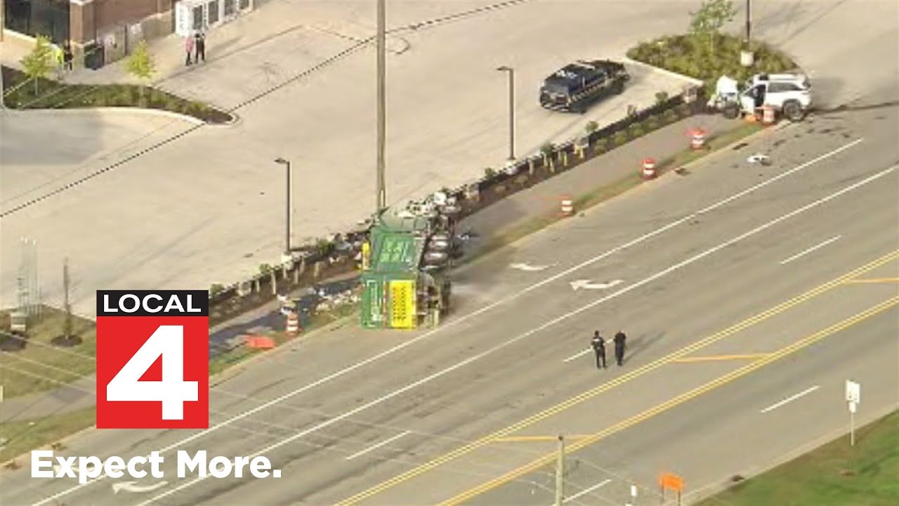 garbage truck flips during crash