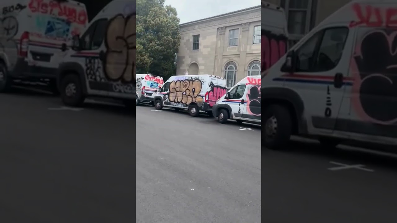 graffiti covers usps trucks acro